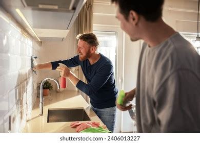 Gay Couple Cleaning Modern Kitchen Home Stock Photo Shutterstock