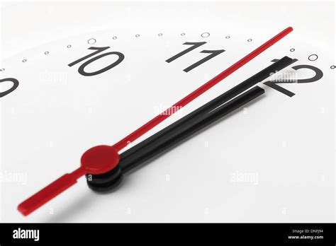 Clock and time running out on white background Stock Photo - Alamy