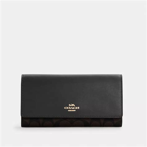 Coach® Outlet Slim Trifold Wallet In Signature Canvas