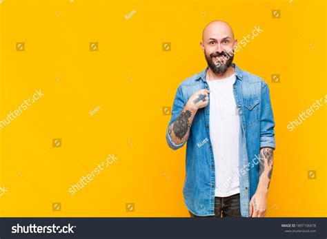 Young Bald Bearded Man Looking Happy Stock Photo 1897106878 Shutterstock