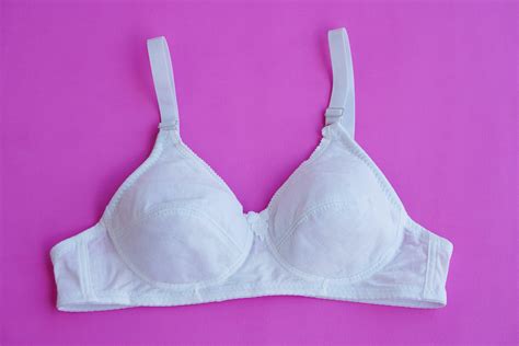 White Cotton Bra On Pink Background Concept Feminine Brassiere Classic Comfortable With Cup A