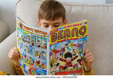 Kid Reading Comic Book Photos, Images and Pictures