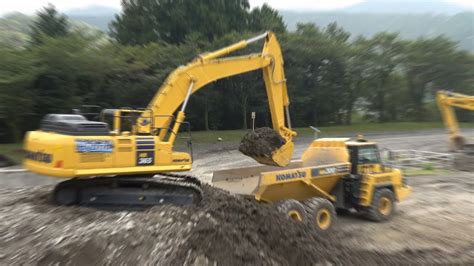 Komatsu Hybrid Hydraulic Excavator Hb And Articulated Dump Truck