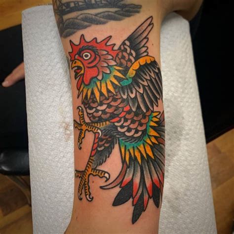 Traditional Style Rooster Tattoo On The Inner Arm