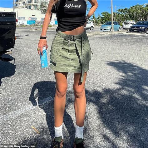 Amelia Hamlin Stuns In A Barely There Metallic Silver Bikini On A Lavish Island Getaway With