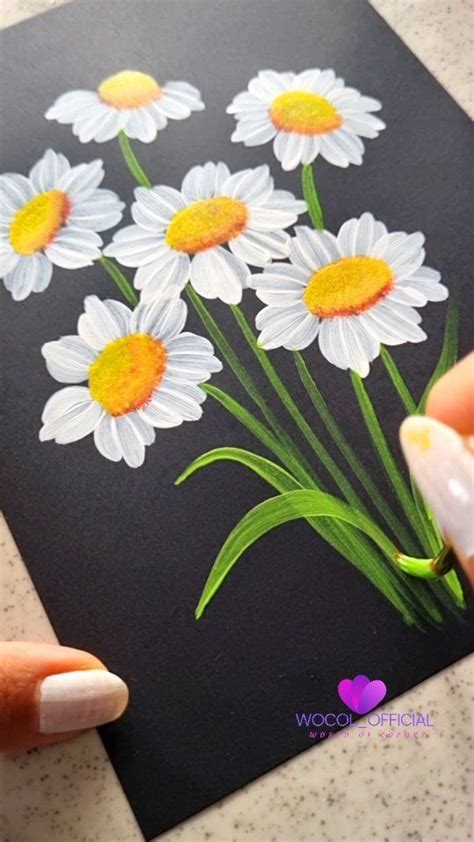 Someone Is Drawing Daisies On A Piece Of Paper