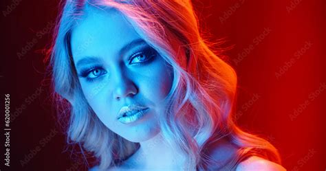 Sexy Caucasian Blonde Girl Look At Camera With Sensual Stare Weariing Bright Glowing Makeup