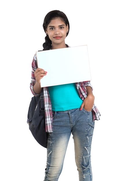 Premium Photo Young Indian Woman With Backpack Standing And Holding