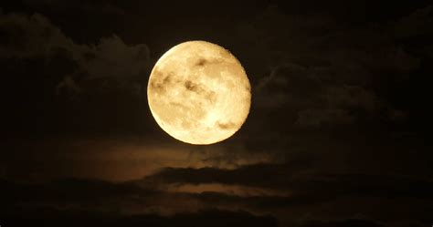 Beautiful Full Moon Shining Through Moving Clouds Backgrounds At Moon