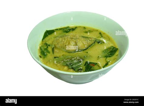 Spicy Boiled Slice Catfish With Basil Leaf In Coconut Milk And Curry On