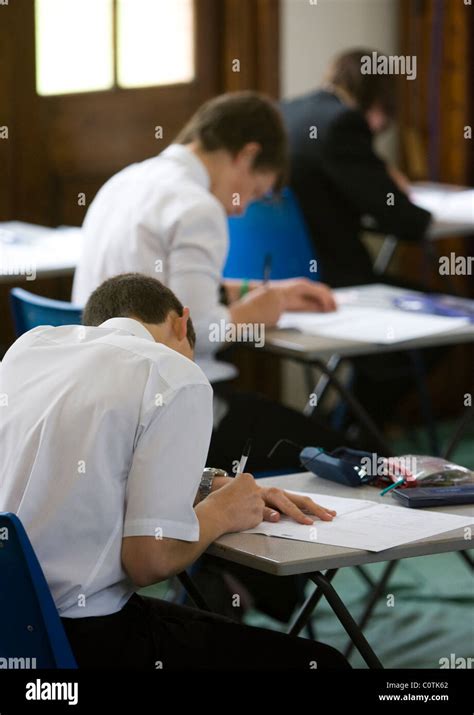Pupils fill an exam hall to take a GCSE exam at Maidstone Grammar ...