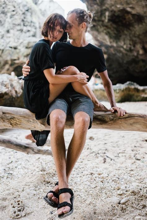 A Romantic Couple Hugging on the Beach · Free Stock Photo