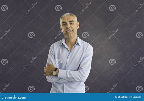 Portrait Of Happy Middle Aged Man On Black Background Stock Image