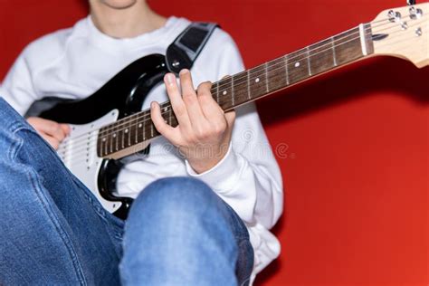 Young Man Playing Electric Guitar Music Instrument Education