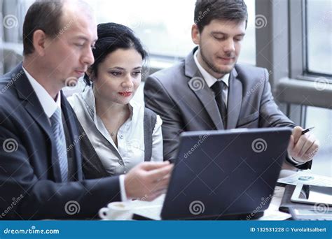 Group of Business People Working on Laptop in the Office. Stock Photo ...