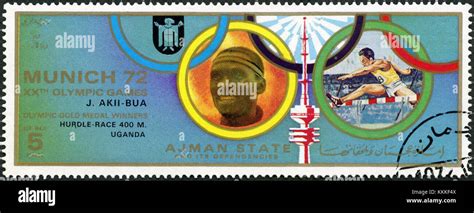 Ajman Circa A Stamp Printed In Ajman Shows John Akii Bua