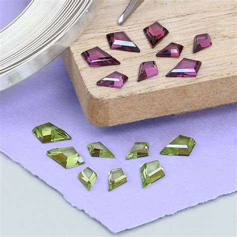 Peridot And Rhodolite Kite Cut Gemstone Collection Jeweller S Bazaar