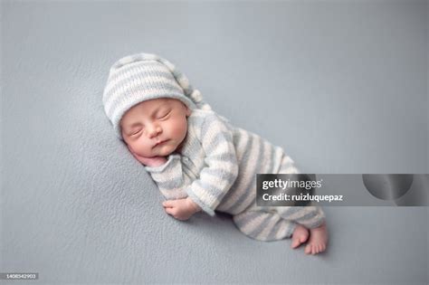 Newborn Baby Boy Sleeping High-Res Stock Photo - Getty Images