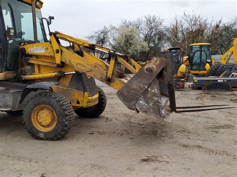 Оренда Екскаватор-навантажувач JCB 3CX з вилами Київ і область
