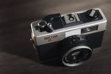 A Close-Up Shot of a Ricoh Camera · Free Stock Photo