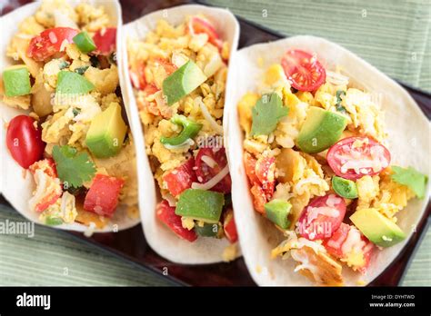 Tacos Filled With Migas A Tex Mex Dish Of Eggs Scrambled With Red Bell