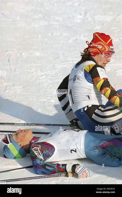 Italys Manuela Di Centa Collapses Beside Russias Ljubov Egorova Rear