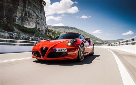 997103 4K Red Cars Highway Front Angle View Alfa Romeo Car