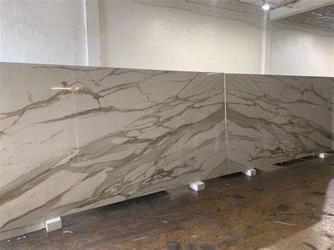 Calacatta Gold Bookmatch Porcelain Slabs Wall Installation Calacatta