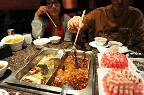 Hot Pot Chain Haidilao Brings Spice To Hong Kong Market Caixin Global