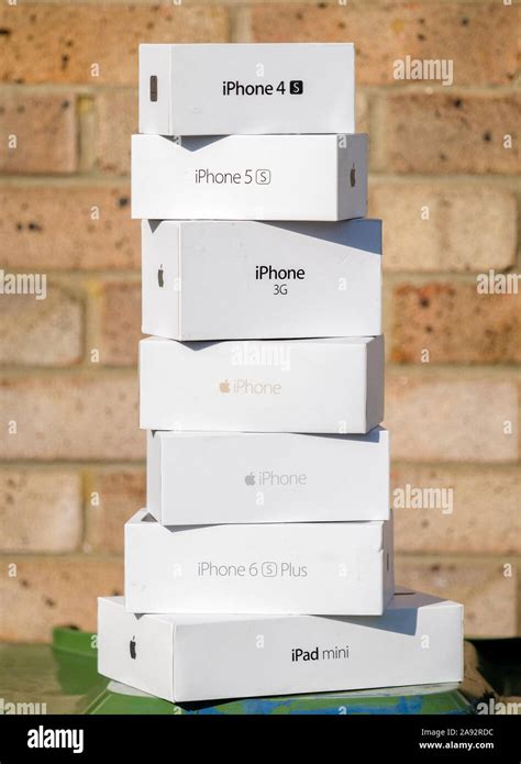 Stack Of Empty Apple IPhone And IPad Packaging Boxes Ready For