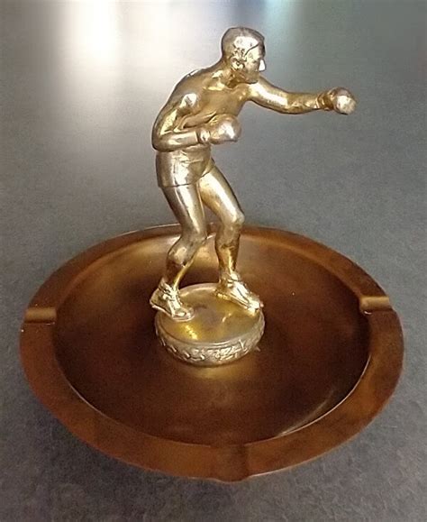 Repairing Athletic Figure Trophies — Harriete Estel Berman