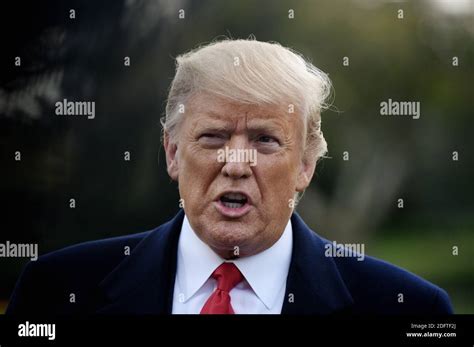 President Donald Trump Answers Questions From The Media As He Departs