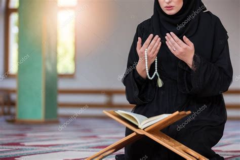 Young Muslim Woman Praying In Mosque — Stock Photo © Fs Stock 168388992