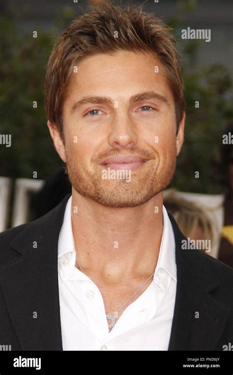 Eric Winter Arriving At The Los Angeles Premiere Of Michael Jackson S This Is It Held At The