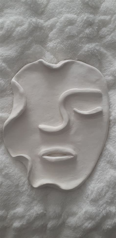 Clay Sculptures Of Faces