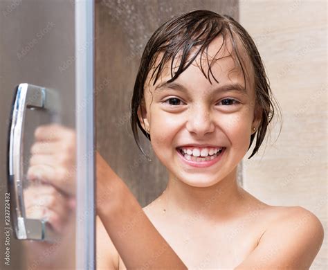 Cheerful Beautiful Girl Bathing Under A Shower At Home Happy Little