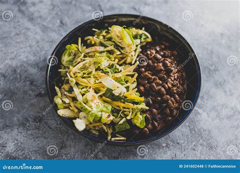 Vegan Nourish Bowl With Black Beans And Mixed Greens Healthy Plant