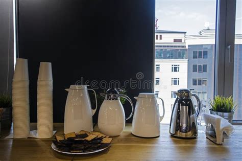 Hot White Kettles With Teas Boiling Water Coffee And Cookies In The Office Stock Photo