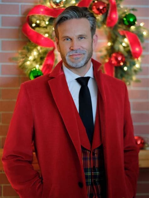 Lights Camera Christmas 2022 John Brotherton Red Coat