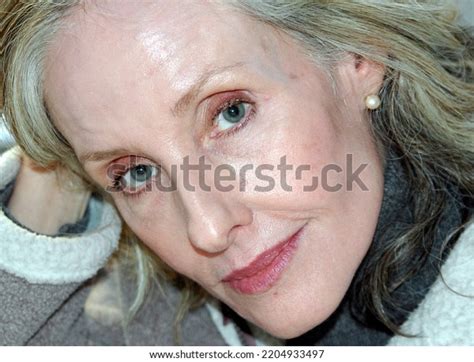 Mature Female Blond Beauty Expressions Indoors Stock Photo