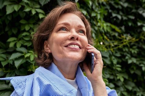 Premium Photo Attractive Senior Woman Talking On The Phone Mature Caucasian Lady Uses
