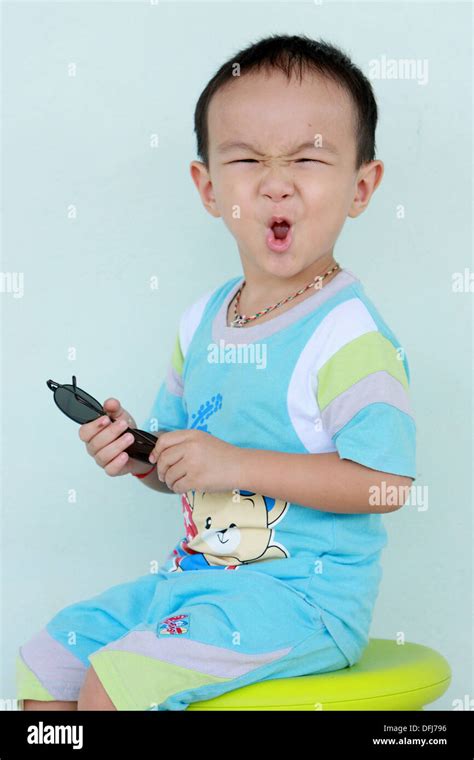 Portrait of a boy with funny face Stock Photo - Alamy