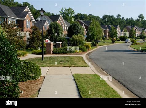 Suburban street neighborhood development with sidewalk, Charlotte, NC ...