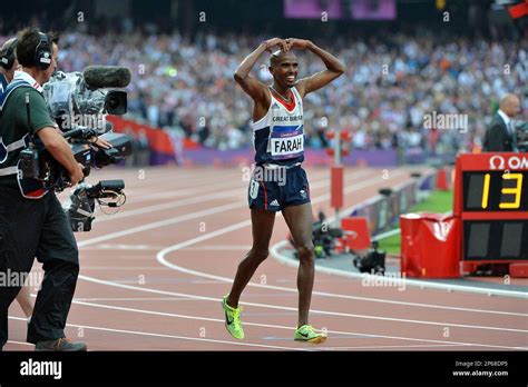 Great Britains Somali Born Athlete Mo Farah Celebrates Doing The