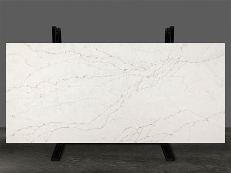 A White Marble Slab With Black Legs On A Gray Background In The Shape Of A Rectangle