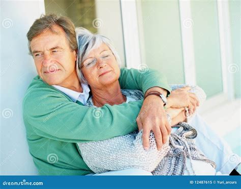 Portrait Of A Retired Old Couple Sitting Together Stock Image Image