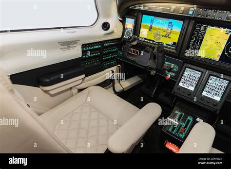 View into the cockpit of a sports plane. Modern Glass cockpit of a ...