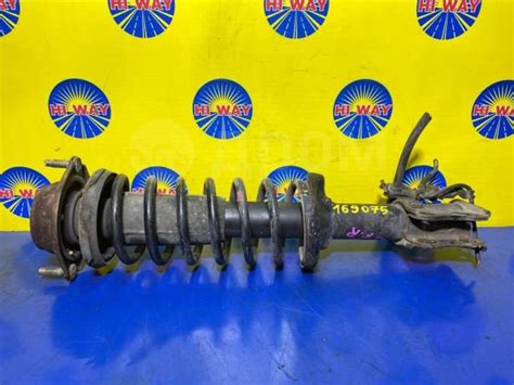Купить Стойка Mazda Demio 1999 D27834700A DW3W B3, передняя правая ...