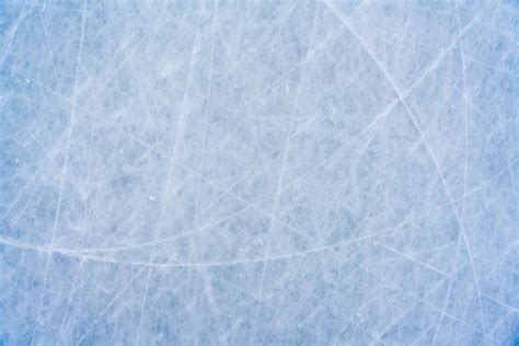 Premium Photo Ice Background With Marks From Skating And Hockey Blue