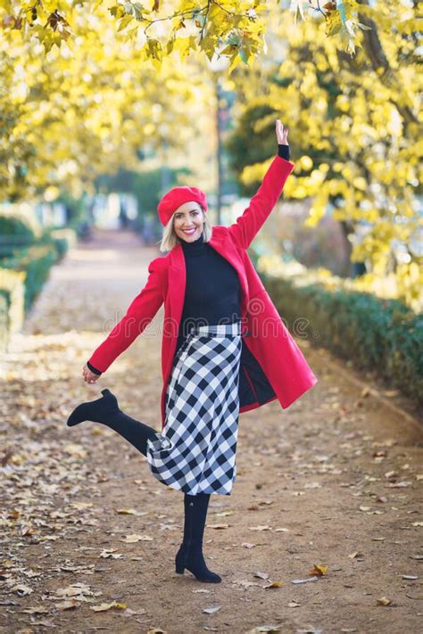 Cheerful Woman In Stylish Outfit In Park Stock Photo Image Of